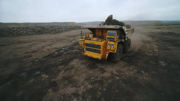 Flying Over a Giant Truck with Coal