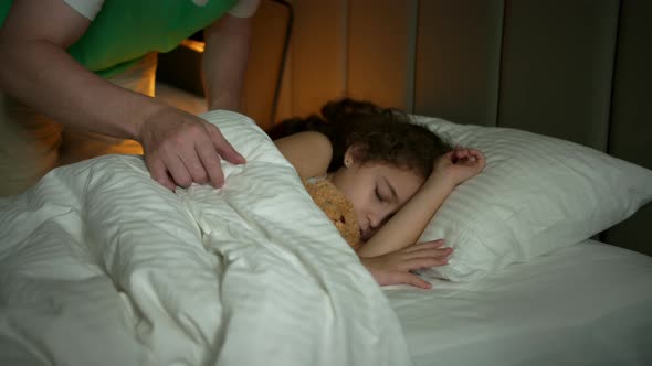 Child Little Baby Girl Sleeps Sweetly in His Crib and Smiles in His Sleep