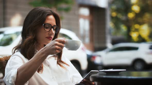 Business Girl in Glasses and White Shirt