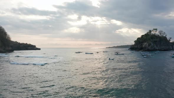 Boats Floating the Ocean Waters Surrounded By Small Islands in Bali, Indonesia