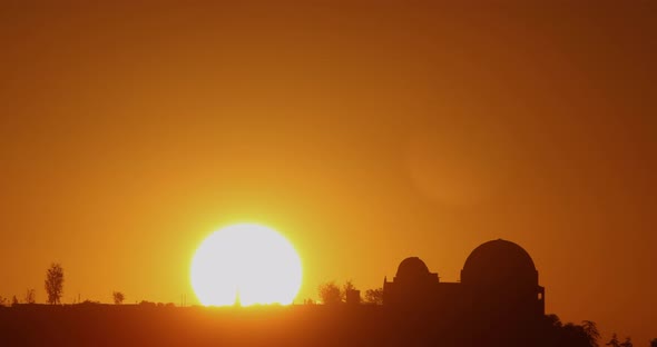 Time lapse of the sun rising from behind the Griffith Observatory