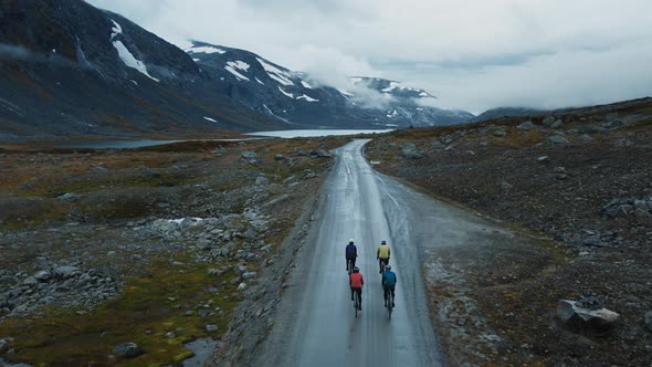 Epic Aerial Drone Shot of Cyclists in Mountains