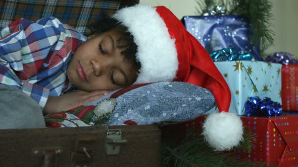 Happy Kid Sleeping Inside Suitcase.