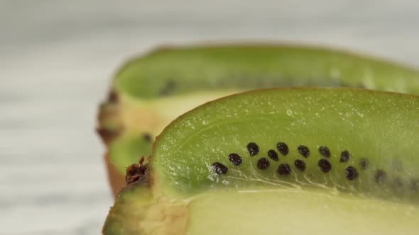 Kiwi fruits on wooden table.