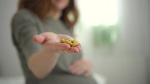 Closeup View of Pills in Hand