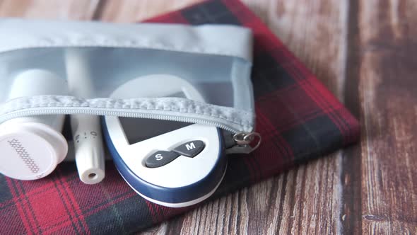 Close Up of Diabetic Measurement Tools in Small Bag