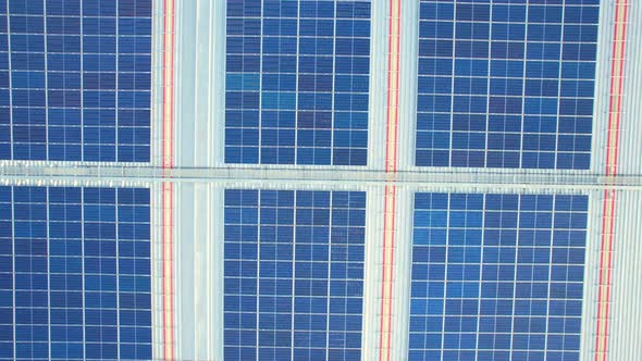 Drone flying over photovoltaic solar panels