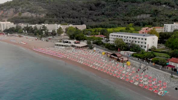 Aerial Drone Cinematic Footage of Sutomore Montenegro beach in the morning.