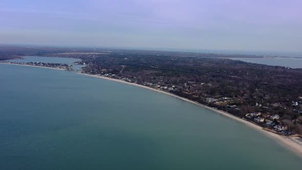 A high angle view over Peconic River looking at Meschutt Beach on Long Island, NY. The camera truck