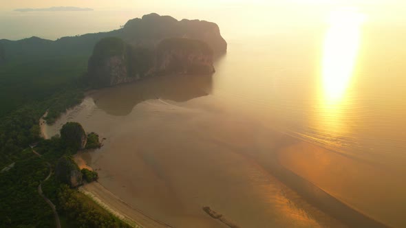 Aerial sunset above mountain silhouette. Beautiful views of the Andaman Sea