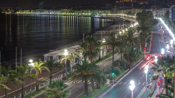 Night Aerial Panorama of Nice Timelapse, France. Lighted Old Town Little Streets and Waterfront