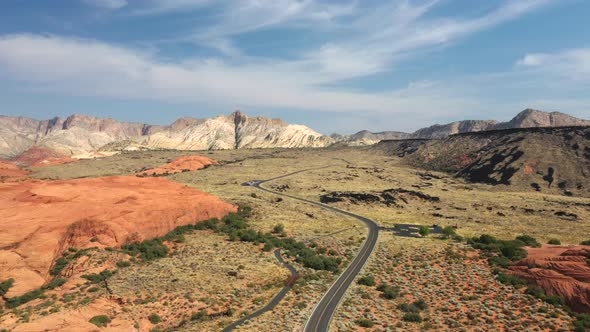 Asphalt Road In Snow canyon state park, St. George Utah, United States. Aerial Wide Shot