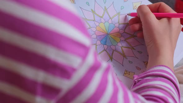 Female Painting Mandalas Antistress Page to Combat Stress