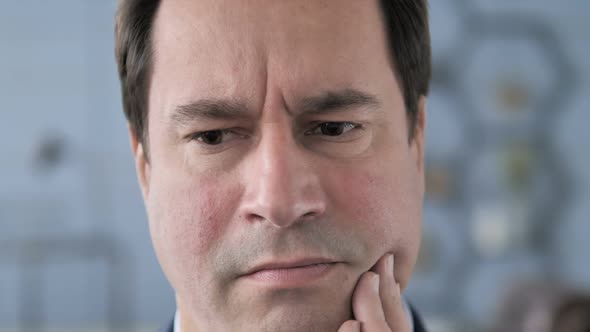 Close Up of Toothache Man with Tooth Infection