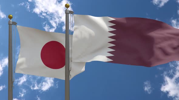 Japan Flag Vs Qatar Flag On Flagpole