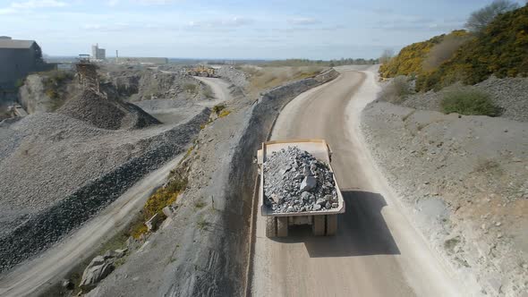 Mine Truck Driving Ore to a Processing Plant