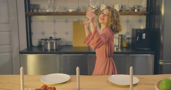 Beautiful Woman Dancing in Kitchen