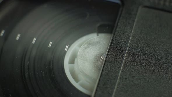 Rotation of the Film Reel of the Cassette Tape on the Right Side of the Video Cassette