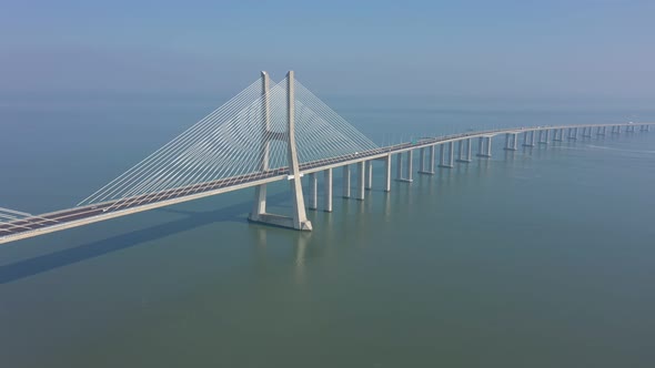 Lisbon Portugal Aerial View of the Vasco Da Gama Bridge on a Foggy Beautiful Morning During Car