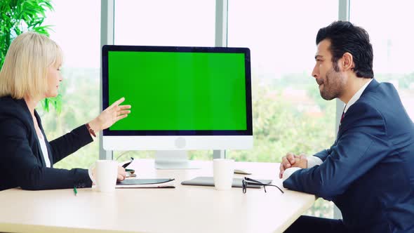 Business People in the Conference Room with Green Screen