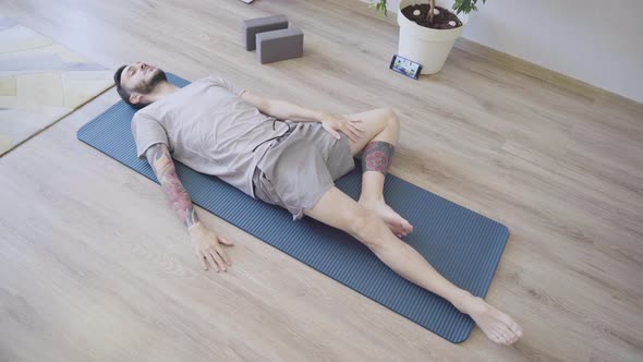 Man Doing Diaphragmatic Breathing Exercise for Relaxation
