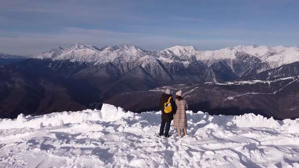 Couple in Snow Mountains