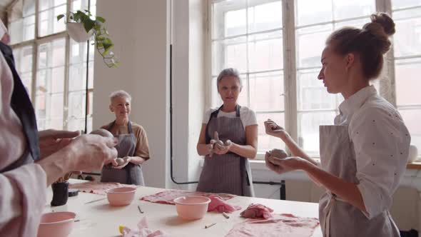 Tutor at Ceramic Lesson in Workshop