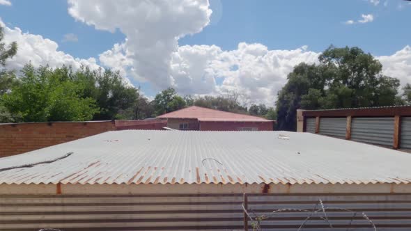 time lapse of a old rusty roof with barb wire