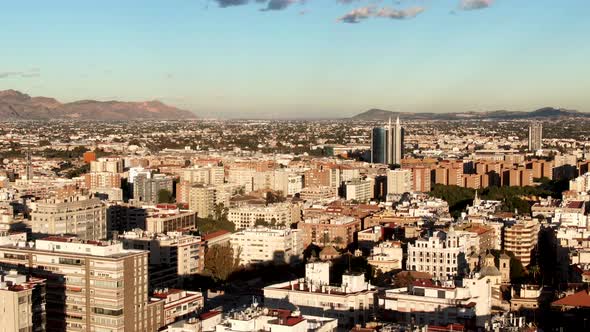 Aerial shot flying over the city of Murcia in Spain on a summers day