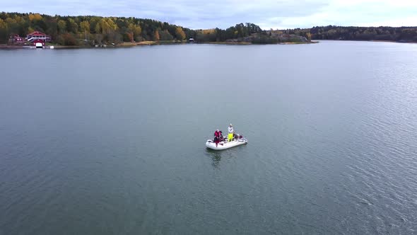 Fisherman an Inflatable Boat at Baltick Sea on Octoober in Aland IslandsIs