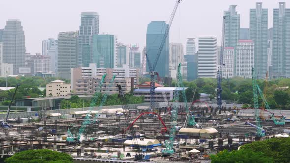 Panoramic View of Cityscape and Construction Site in Metropolis