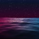 Beautiful Ocean Under Blue And Red Night Sky Reflections With Falling Stars Loop 4k - VideoHive Item for Sale