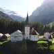 Aerial video of a church in a villiage along the Klausen Pass in Switzerland. - VideoHive Item for Sale
