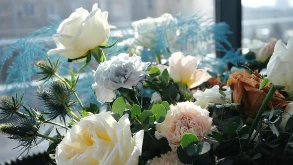 Beautiful Bouquet of Multi-colored Wedding Flowers for Bride of White-blue Orchids and Cream and