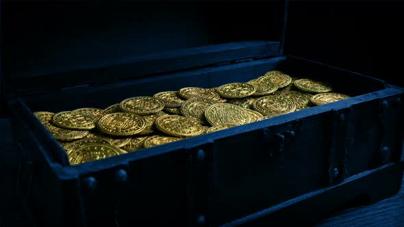 Chest Of Bright Gold Coins In Dark Room