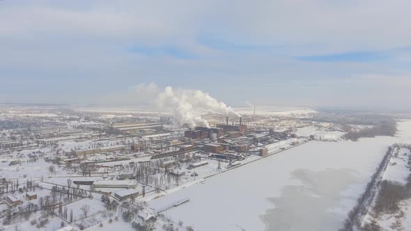 smoke from factory chimneys pollute air aerial view