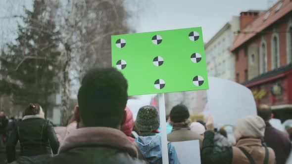 Blank Banner in the Hands of a Demonstration. Empty Placard Political Protest.