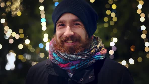 Handsome Smiling Young Caucasian Red Bearded Man in Festive Christmas Mood