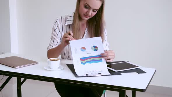 Blonde Business Woman Working at Modern Office