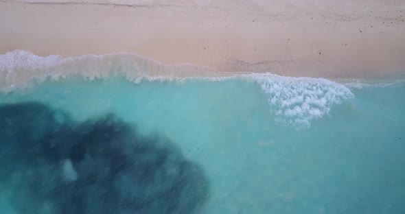 Luxury above abstract view of a summer white paradise sand beach and aqua blue water background in h