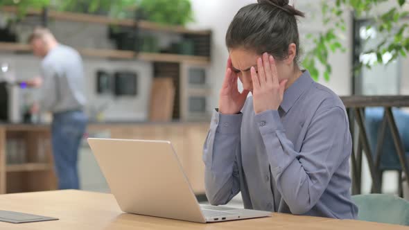 Indian Woman Having Headache While Using Laptop