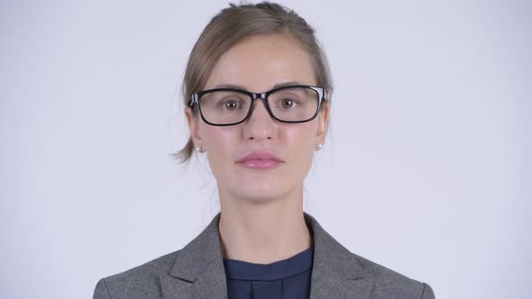 Face of Happy Young Beautiful Businesswoman with Eyeglasses Smiling