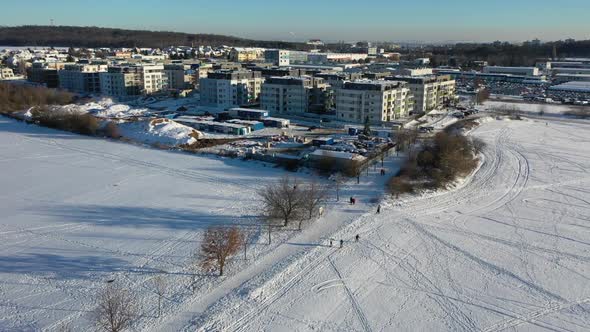 Aerial view of Zlicin snow capped residential buildings at winter, suburban area of Prague, Czech Re