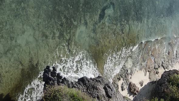 Vertical Video of the Ocean Near the Coast of Zanzibar Tanzania Aerial View