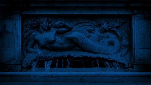 Water Fountain With Mermaid At Night