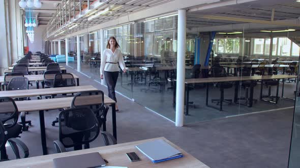 Young Business Woman Posing at Workplace