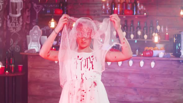 Teenage Girl Dressed in a Dead Bride Costume Before a Halloween Party