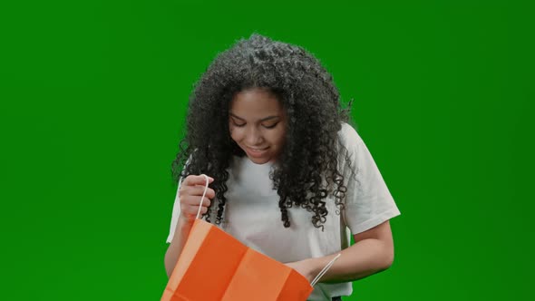 Green Screen Cheerful Lady Holds Gift Box