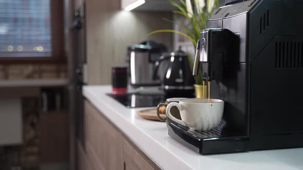 Automatic Coffee Machine Making Coffee for Girl to Breakfast