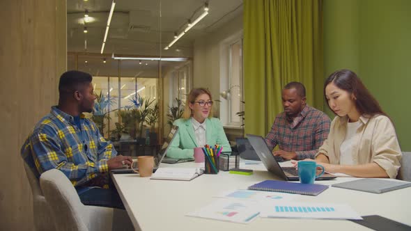 Business Colleagues Working in Conference Room